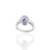 Polished ring design with oval stone and layered sparkle