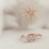 Oval diamond ring with pave setting and polished finish