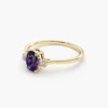 Elegant ring with oval amethyst centre stone