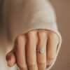 Sterling silver oval ring with side flare diamond accents