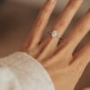 Elegant oval ring with subtle side flare sparkle