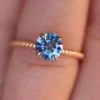 Pastel blue sapphire and diamond engagement ring in sterling silver