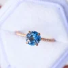 Sterling silver ring with pastel blue sapphire and pave diamond accents