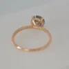 Engagement ring with thick gold plating and a pastel blue centre stone