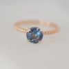 Graceful engagement ring with a soft pastel blue sapphire design