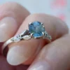 Sterling silver ring with pastel blue CZ sapphire and pave stones