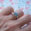 Pastel blue sapphire style ring with delicate leaf detailing