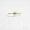 Oval cut 1.5 ct ring with pave band