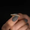 Pave band ring in 925 sterling silver with a polished profile