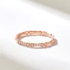 Pave diamond detail defines this organic-shaped ring