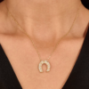 Sterling silver horseshoe necklace with pave diamond accents