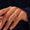 Wide 925 sterling silver wedding band with a twisting silhouette