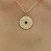 Evil eye talisman charm with 112 diamonds and 7 sapphires