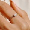 Sterling silver engagement ring featuring a pear-shaped CZ diamond detail