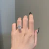 925 Sterling Silver Pear Shaped 3-Prong Hidden Halo Pave Bridge Solitaire Ring - Image 4