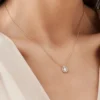 Halo necklace with one pear stone and pave accents