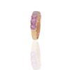 Slim band style ring with pink sapphire accents