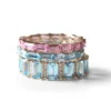 Pink sapphire eternity ring with a continuous baguette-cut design