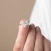 Princess cut CZ diamond engagement ring with pave stone setting