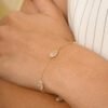 Thin sterling silver bracelet with thick gold plating and rainbow moonstone