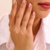 Slim rhombus wedding band with a geometric top detail