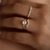 Ring with a distinctive rose cut stone and pave setting