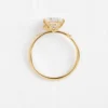 Round cut premium CZ diamond ring with polished gold-plated finish