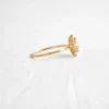 Gold-plated sterling silver ring with pave-set CZ diamond stone
