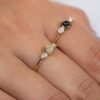 Sterling silver ring featuring a bezel-set sapphire-inspired stone