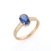 Ring with a single sapphire and pave prong setting