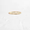 Sidestep ring with a modern shape and sparkling CZ detailing