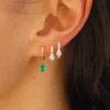 Sterling silver huggie earring with premium CZ emerald