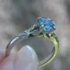 925 sterling silver solitaire engagement ring with teal sapphire centre stone