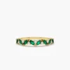 Sterling silver ring with a slanted emerald and round stones