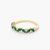 Contemporary ring featuring a sleek angled stone arrangement