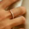 Sterling silver ring featuring marquise and round CZ stones in prong settings