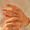 Gold-plated sterling silver band with clean dotted edging
