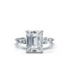 Gold-plated ring with a graceful emerald-shaped CZ stone
