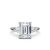 Engagement ring with a 1.8 mm band and emerald-cut stone