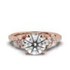 Engagement ring with marquise, pear and round side stones