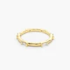 Baguette diamond eternity ring with a streamlined band