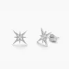 Diamond earrings featuring a radiant starburst motif