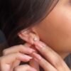 Gold-plated sterling silver stud earrings with diamond-inspired sparkle