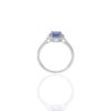 Round tanzanite ring with diamond-style pave accents in sterling silver