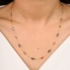 925 sterling silver necklace featuring oval tanzanite and tourmaline stations