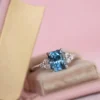 Engagement ring with pave-set CZ diamond side stones