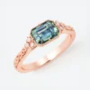 Teal green sapphire-inspired sterling silver engagement ring