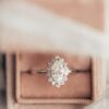 Diamond ring featuring a distinctive starburst halo design