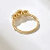 Three stone halo ring with refined slim band