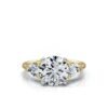 Three stone pear and round diamond ring in sterling silver and gold plating